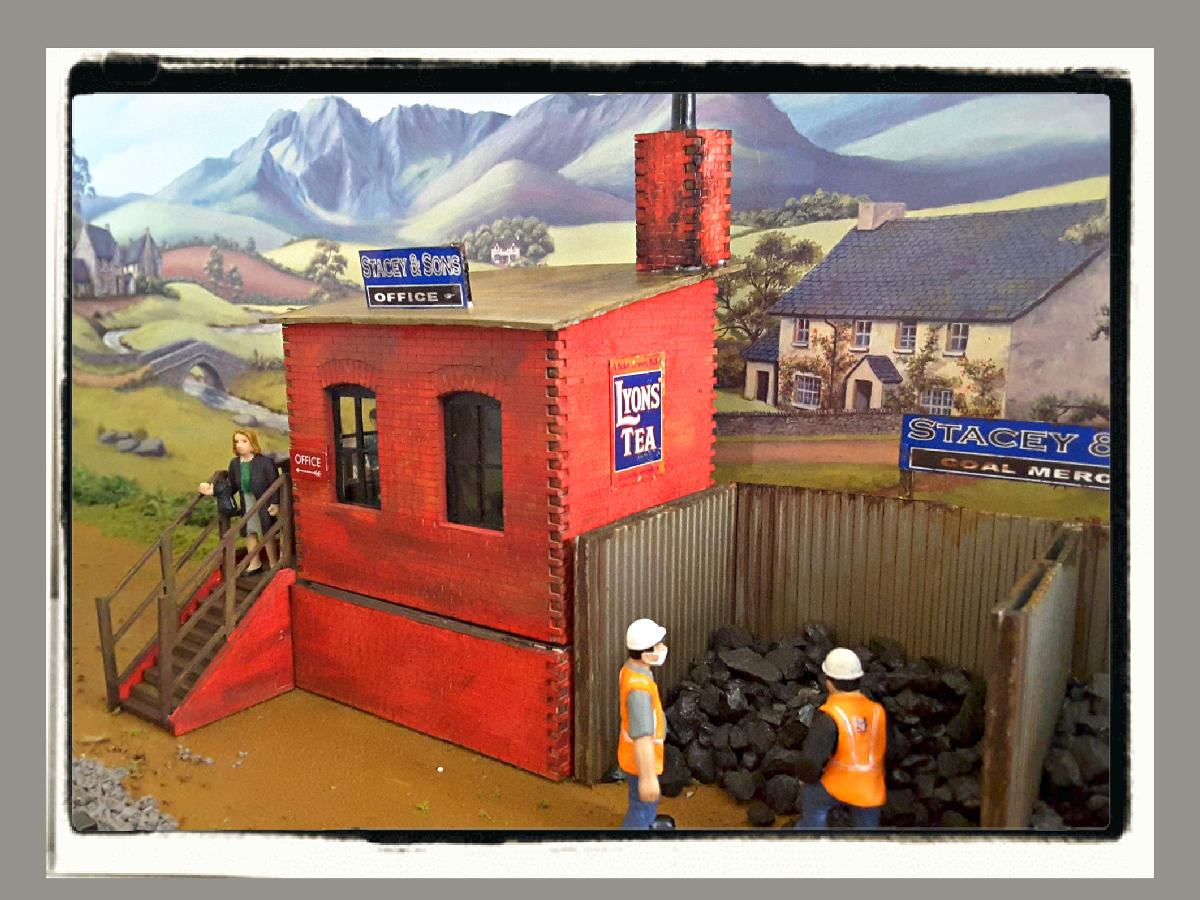 Various pictures of arches, offices, and warehouse in O gauge assembled, painted, and finished by Graeme.