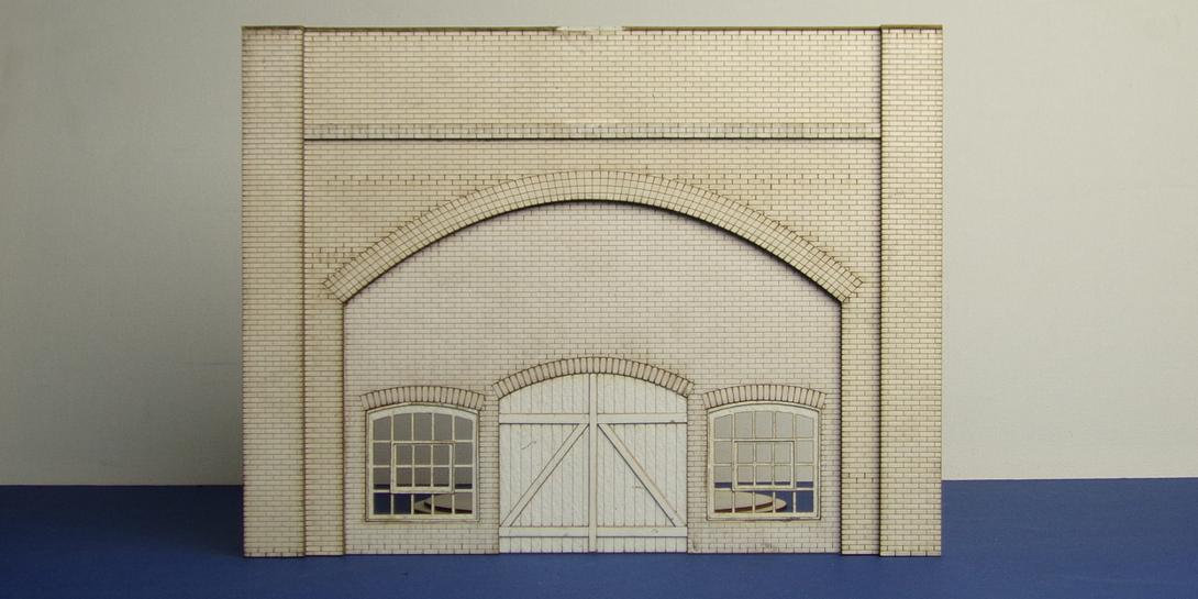 A 70-02 O gauge brick arch with warehouse fittings