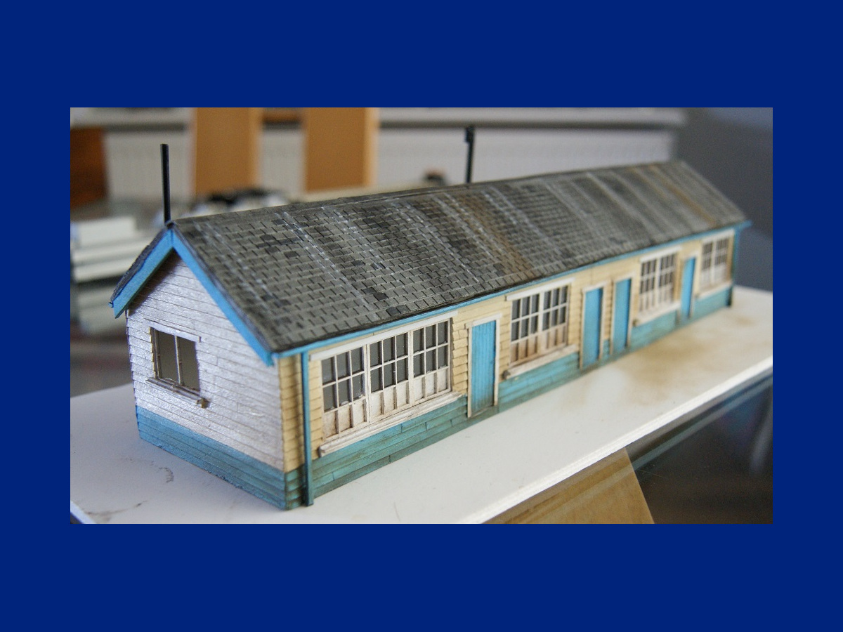 "Building showcasing the BM 40-00 roof tile strips. Beautifully finished by Clare and Martin with acrylics, weathering powder, and lacquer."